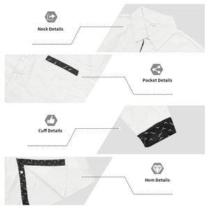 Detail view of men's white linen shirt showing black seagull patterns on pocket and cuffs
