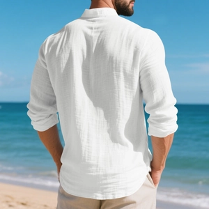 Rear view of white linen Henley shirt for men on a sunny beach with sea background