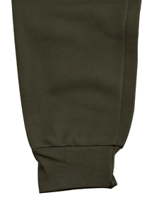 Detailed close-up of ribbed cuffs on olive green fleece tracksuit showing premium knit texture