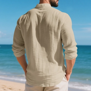 Detailed back view of khaki linen shirt fabric texture on a beach during summer