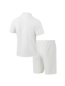 Rear view of white waffle knit shirt and shorts set showing texture and relaxed fit