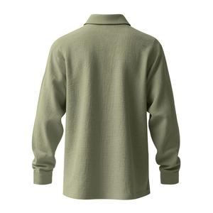 Detail of sage green linen polo shirt showing breathable textured fabric and buttoned cuffs