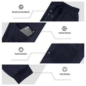 Detailing waffle texture, drawstring waist, and deep pockets of navy joggers pants