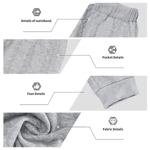 Detailopname van grijze jacquardstof op deze sportieve joggingbroek voor heren