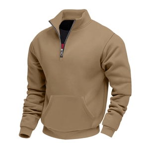 Detail of khaki fleece hoodie featuring a 1/4 metal zipper and front kangaroo pocket