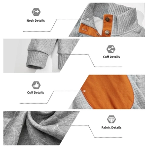Detail van grijze gewatteerde textuur, oranje opstaande kraag en drukknopen op sweatshirt