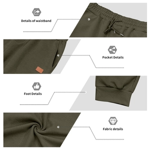 Detailed texture of olive green men joggers with geometric knit fabric and elastic waist