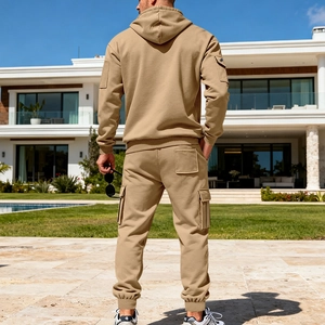 Rear view of khaki men's hooded tracksuit with utility cargo pockets and ribbed cuffs