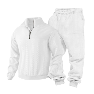Detail of white knit set featuring cable texture and half-zip collar for men