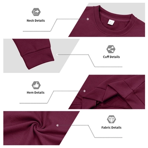 Detail of burgundy knitted sweatshirt with textured geometric pattern and ribbing