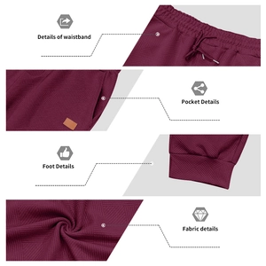 Detail view of burgundy jacquard knit joggers with drawstring waist and textured fabric