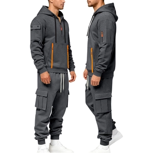 Detail of grey hoodie set featuring vibrant orange zipper and tactical cargo pockets
