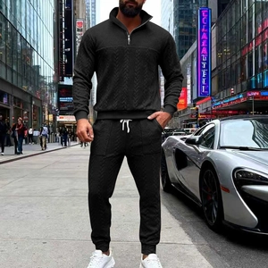 Men's black two-piece casual tracksuit set with unique V-shaped textured embossed fabric