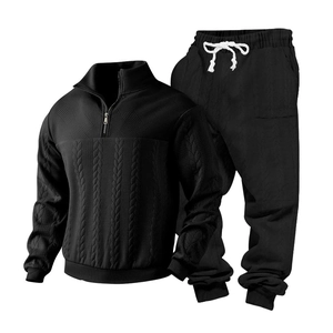 Detail of black men's knit set featuring 3D cable texture and half-zip collar design