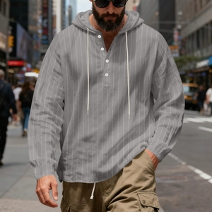 Detail of grey striped linen hoodie shirt featuring Henley collar and white buttons