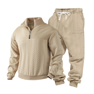 Close-up detail of khaki cable-knit texture on men's two-piece leisure tracksuit set