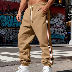 Khaki men's joggers with side stripes and elastic drawstring waist in a loose fit