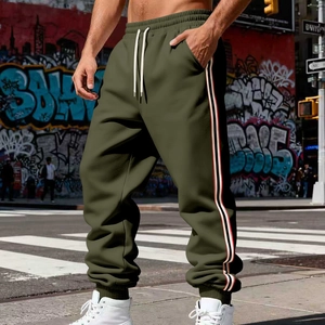Olive green men's joggers with triple side stripes and elastic drawstring waist