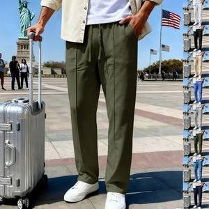 Men's twill cotton linen straight-leg drawstring pants shown in military green for travel