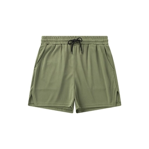 Detail of olive green athletic shorts featuring breathable mesh and side slits