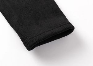 Detail shot of the 300g polar fleece cuff with durable double-needle stitching in black