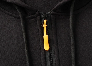 Detail of hoodie with black resin zipper and contrasting orange matte rubber puller