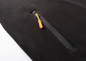 Detailed close-up of a black knit hoodie featuring a waterproof zipper and orange pull cord