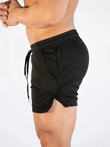 Men's black quick-dry athletic shorts with side slits and drawstring waist for gym training