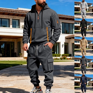 Men's casual hoodie set with utility cargo pants and orange zipper details in dark grey