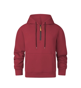 Detail of burgundy hoodie with contrast orange zipper puller and kangaroo pocket