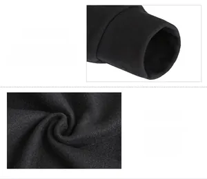 Detail view of elastic ribbed cuffs and soft fleece lining texture of the black hoodie