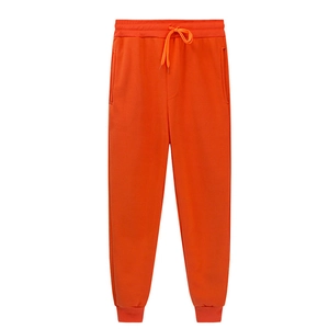 Bright orange fleece-lined joggers for men with drawstring waist and ribbed cuffs