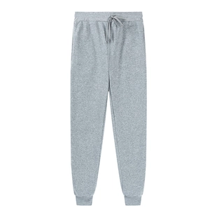 Grey fleece jogger pants with elastic drawstring waist and ribbed cuffs on white background