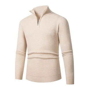 Detailed view of beige quarter-zip sweater with waffle knit texture and ribbed collar