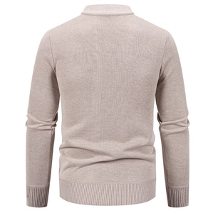 Detailed rear view of oatmeal men's knit sweater featuring ribbed cuffs and fine texture