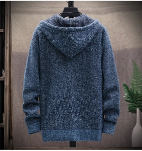 Detail view of winter knitted cardigan with thick fleece lining and ribbed cuffs for warmth