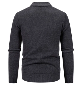 Rear view of men's dark grey knit cardigan sweater with ribbed hem and textured finish