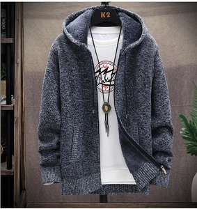 Detail view of thickened fleece lining and textured knit texture on hooded cardigan