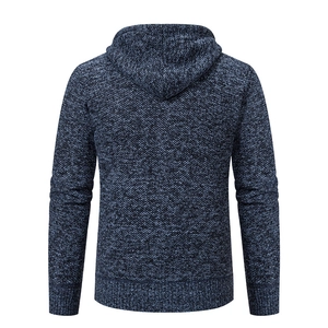 Detailed back view of a navy blue chunky knit hoodie with thick ribbed cuffs and hem