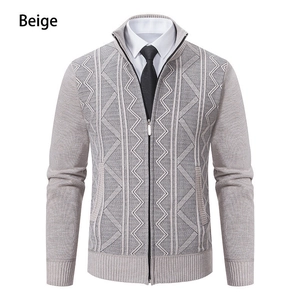 Detail of men's beige knitted cardigan featuring textured geometric patterns and zip collar