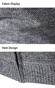 Macro shot of grey knit fabric and black zipper hem design on a men's hoodie sweater