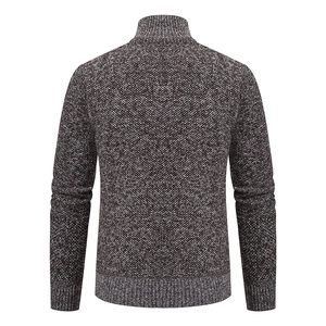 Back view of brown knit cardigan showing ribbed cuffs and detailed fabric texture
