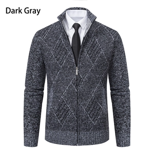 Detailed macro view of dark gray knit cardigan with vertical diamond texture and stand collar