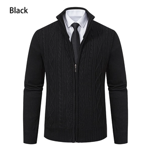 Close-up of black cable-knit men's cardigan sweater with stand collar and zipper detail