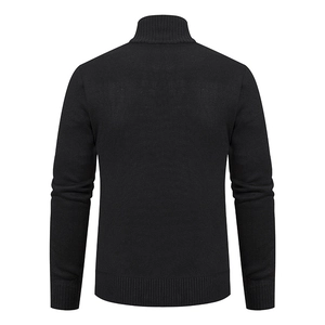 Detail view of the back of a men's black knit cardigan with ribbed cuffs and hemline