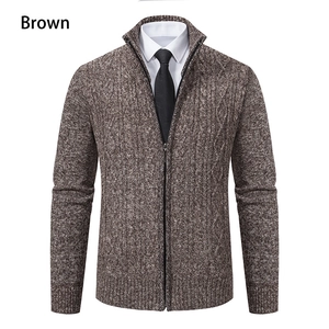 Close-up of brown cable knit men sweater cardigan with zipper and stand collar