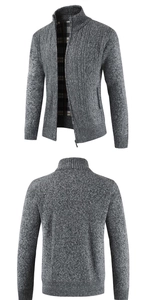 Detail of grey cable knit cardigan with soft plaid lining and full zipper closure