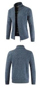 Detail view of men's cable knit cardigan with stand collar and plaid fleece lining