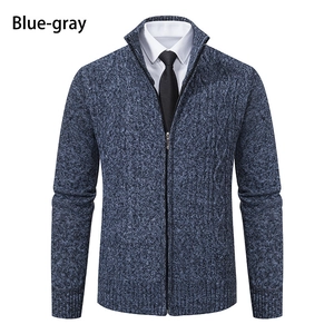 Detailed blue-gray cable knit texture on a men's stand collar zip cardigan sweater