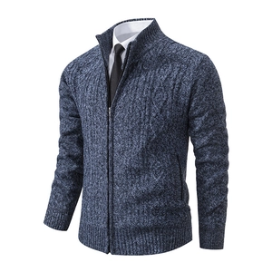 Men's navy blue cable knit zip cardigan with a stand collar and ribbed cuffs design
